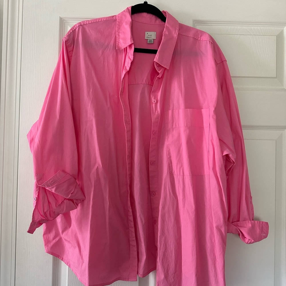 pink button down top